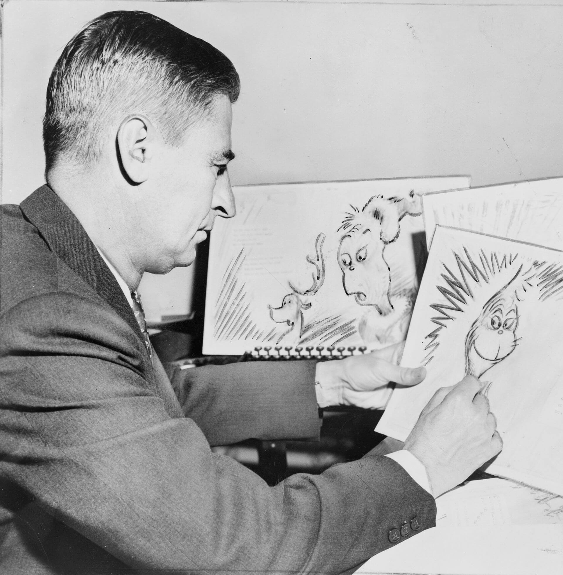 Dr. Seuss sketching mockups of the Grinch while working on How the Grinch Stole Christmas! (1957)